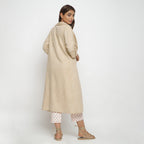 Back View of a Model wearing Beige Lapel Collar Cotton Overlay