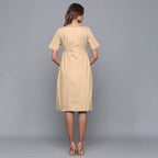 Back View of a Model wearing Beige Paneled Cotton Flannel Dress