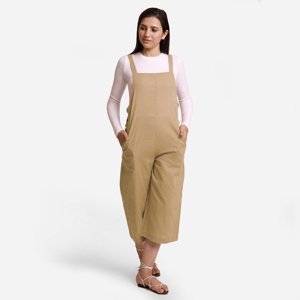 Front View of a Model wearing Beige Pinafore Midi Length Dungaree