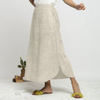 Left View of a Model wearing Beige Printed Breezy Blue A-Line Skirt