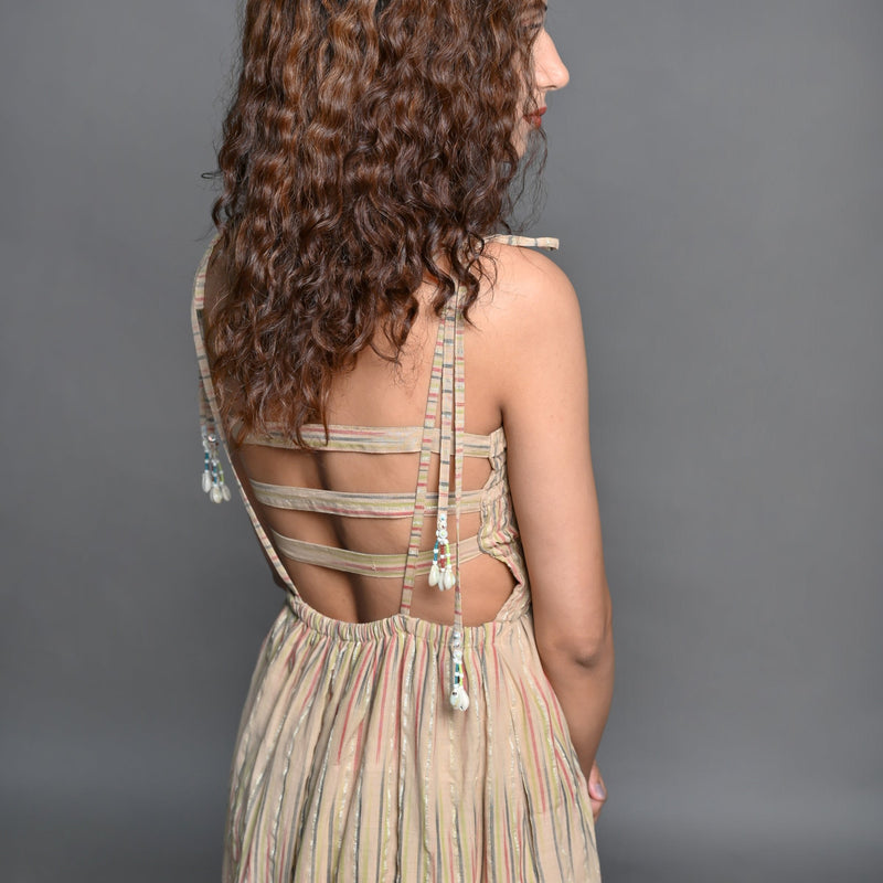 Back Detail of a Model wearing Beige Striped Handwoven Cotton Boho Tier Dress