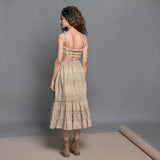 Back View of a Model wearing Beige Striped Handwoven Cotton Boho Tier Dress