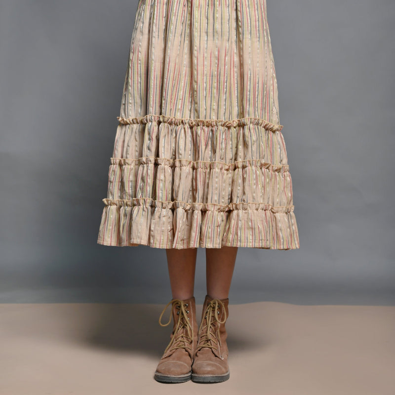 Close View of a Model wearing Beige Striped Handwoven Cotton Boho Tier Dress
