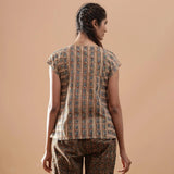 Back View of a Model wearing Beige Kalamkari A-Line Striped Top