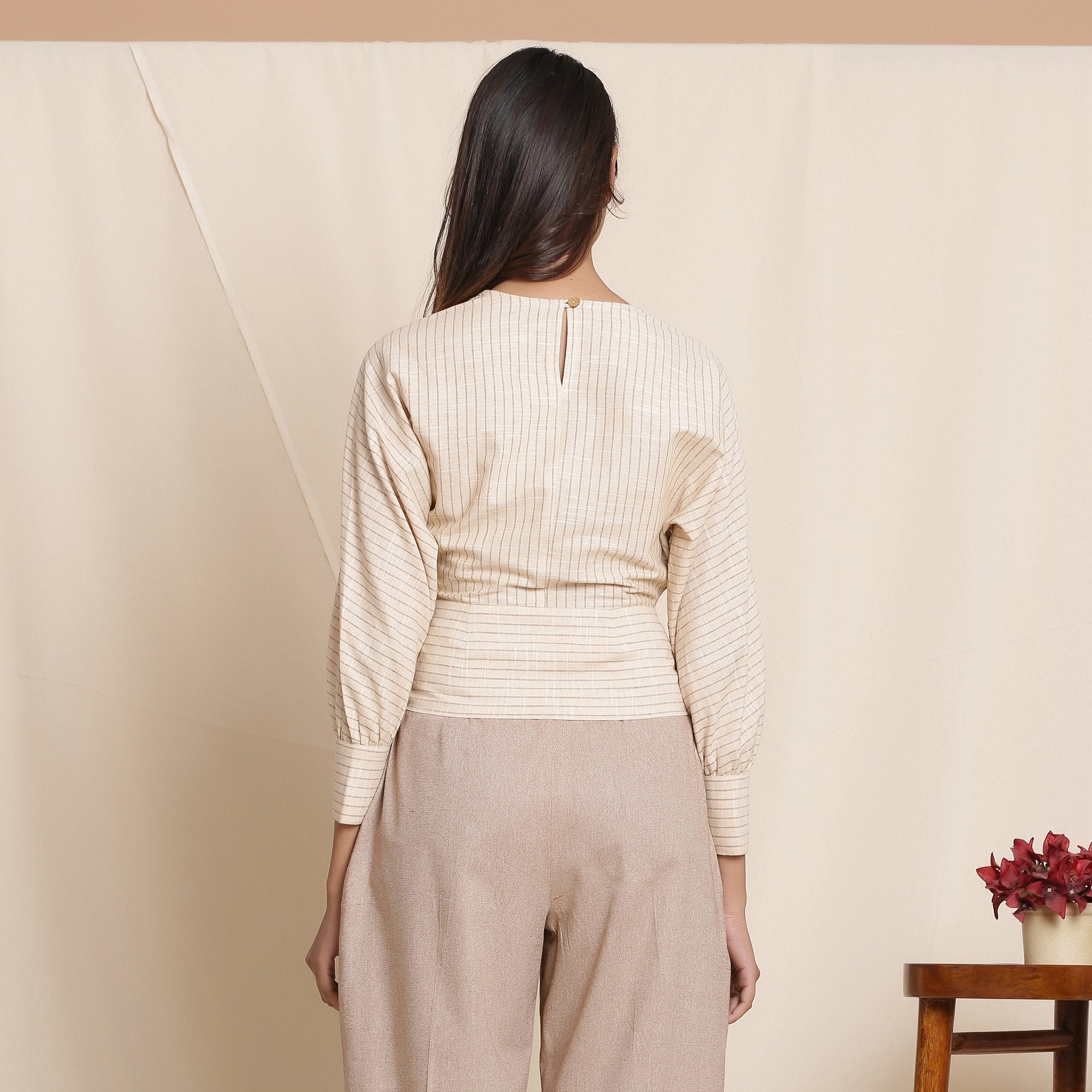 Back View of a Model wearing Beige Striped Surplice Neck Cotton Blouson Wrap Top
