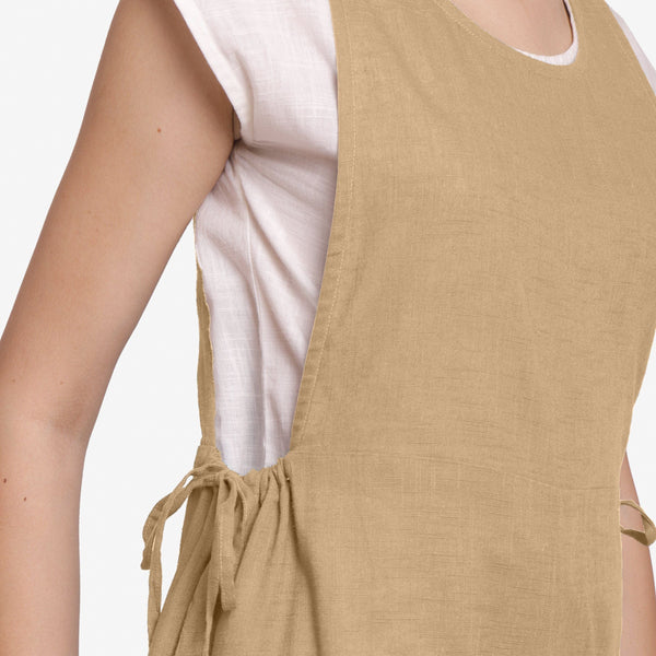 Right Detail of a Model wearing Beige Waist Tie Up Pinafore Jumpsuit