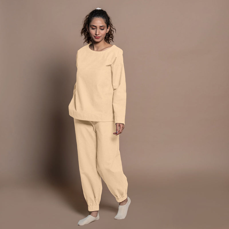 Left View of a Model wearing Beige Warm Cotton Flannel Elasticated High-Rise Jogger Pant