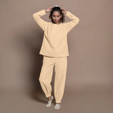 Front View of a Model wearing Beige Warm Cotton Flannel Elasticated High-Rise Jogger Pant