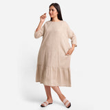 Front View of a Model wearing Beige Yarn-Dyed 100% Cotton Tier Midi Dress