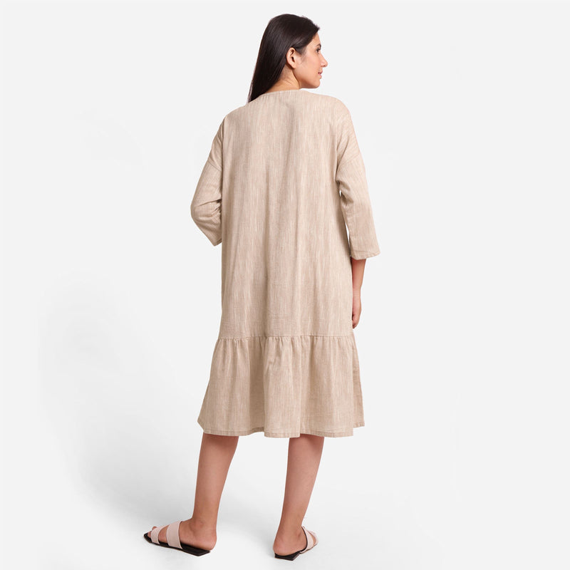 Back View of a Model wearing Beige Yarn-Dyed 100% Cotton Tier Midi Dress