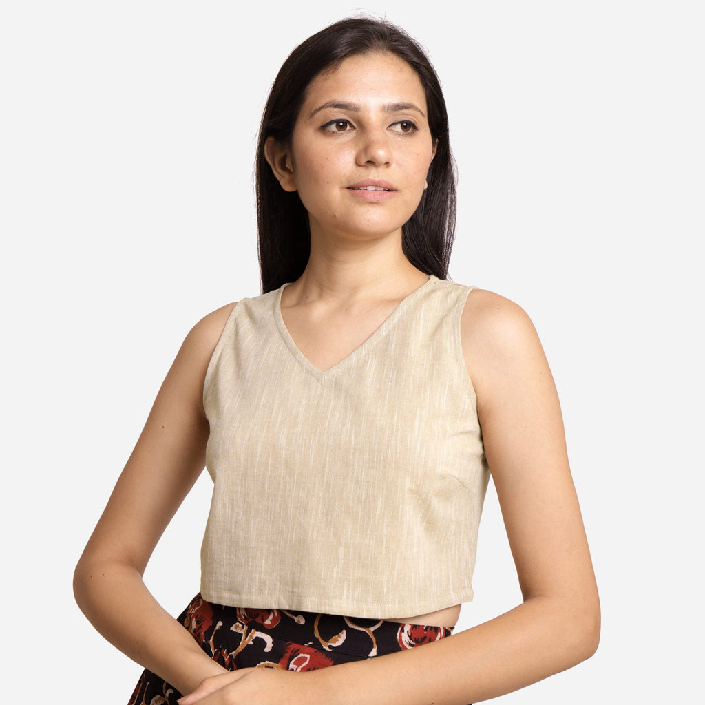 Front View of a Model wearing Solid Beige Yarn Dyed Cotton Crop Top