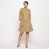 Front View of a Model wearing Beige Yoked Cotton Tunic Dress