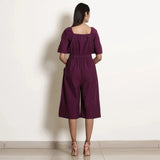 Back View of a Model wearing Berry Wine Warm Cotton Knee Length Flared Jumpsuit