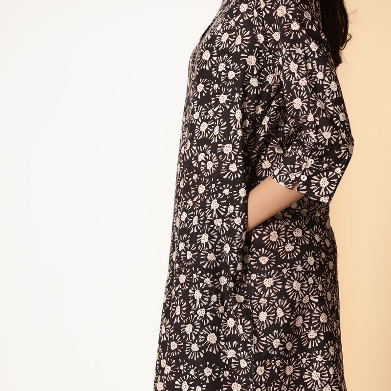 Front Detail of a Model wearing Black Bagru Block Printed Button-Down Dress