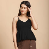 Front View of a Model wearing Black Cotton Flax Slim Fit Pleated Camisole Top