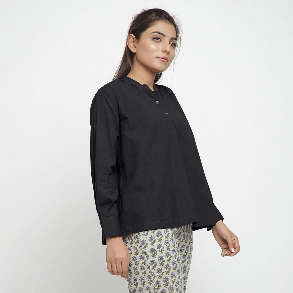 Right View of a Model wearing Black Cotton Flax Straight Yoked Top