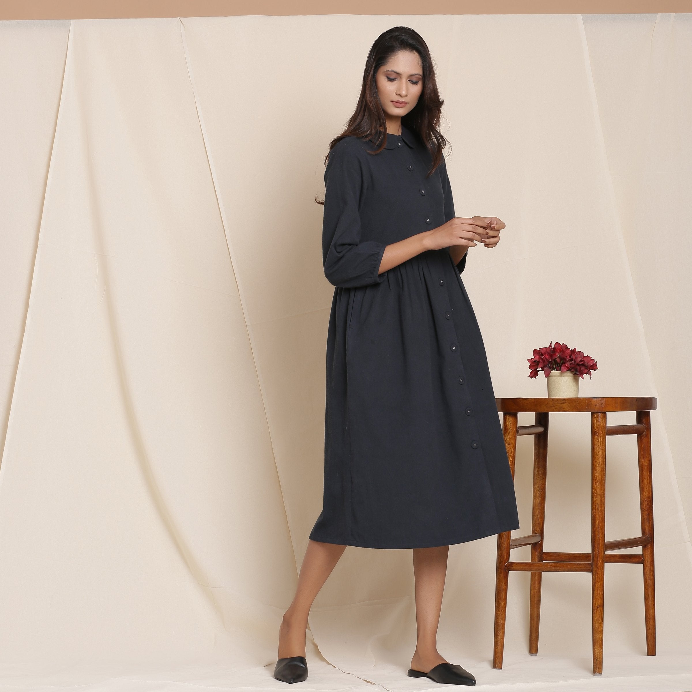 Right View of a Model wearing Black Warm Cotton Flannel Peter Pan Midi Dress