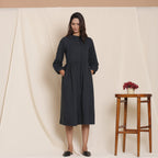 Front View of a Model wearing Black Warm Cotton Flannel Peter Pan Midi Dress