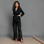 Front View of a Model wearing Black Handspun Cotton Belted Single-Breasted Blazer