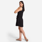 Left View of a Model wearing Black Patch Pocket Round Neck Dress