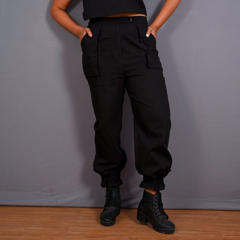 Front View of a Model wearing Black Warm Cotton Flannel High-Rise Convertible Jogger Cargo Pant