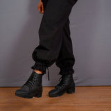 Close View of a Model wearing Black Warm Cotton Flannel High-Rise Convertible Jogger Cargo Pant