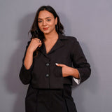 Front View of a Model wearing Black Warm Cotton Flannel Single-Breasted Crop Blazer