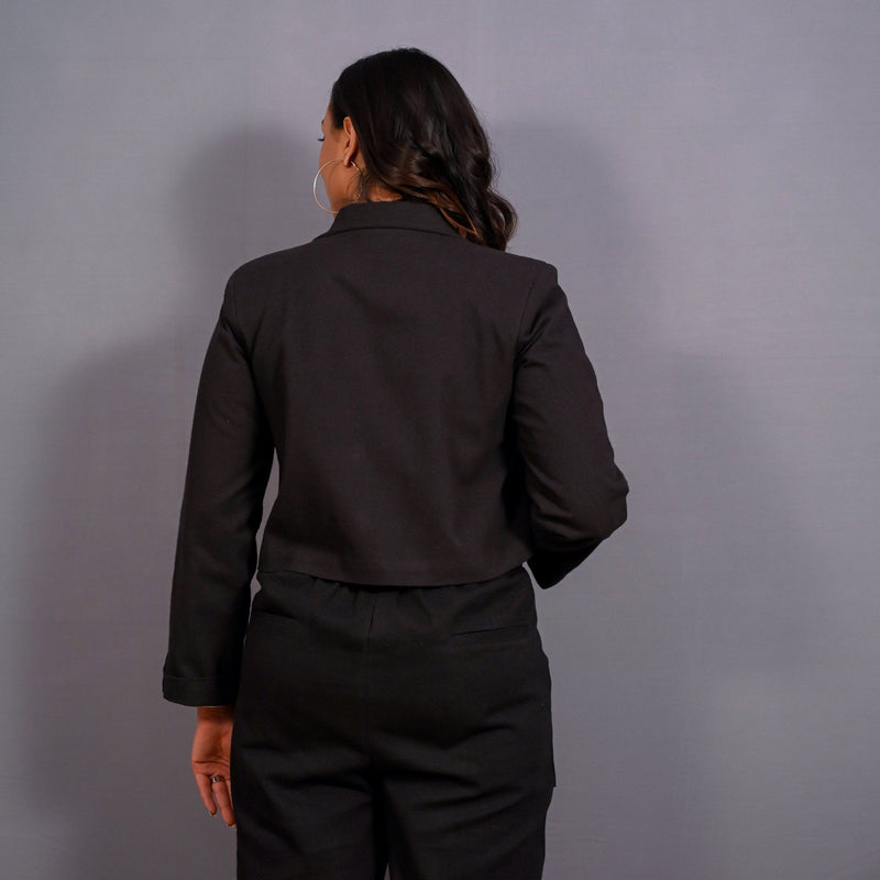 Back View of a Model wearing Black Warm Cotton Flannel Single-Breasted Crop Blazer