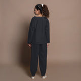 Back View of a Model wearing Black Warm Cotton Flannel Round Neck Sweatshirt