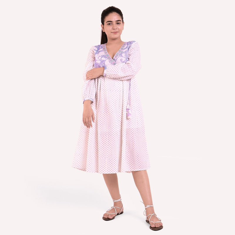Front View of a Model wearing White Block Printed Cotton Knee Length Wrap Dress