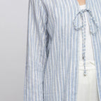 Front Detail of a Model wearing Blue and White Striped V-Neck Shrug