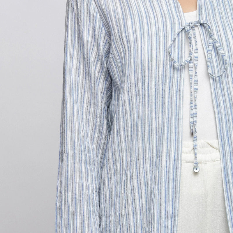 Front Detail of a Model wearing Blue and White Striped V-Neck Shrug