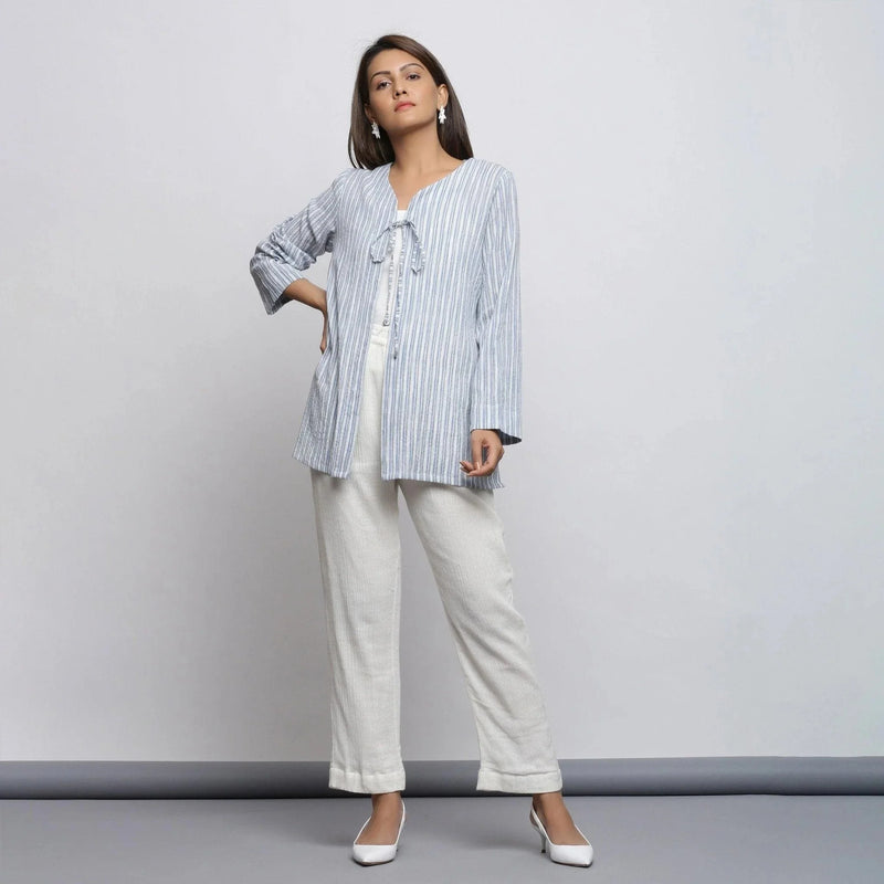 Front View of a Model wearing Blue and White Striped V-Neck Shrug