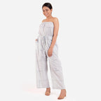 Left View of a Model wearing Blue Straight Tube Neck Jumpsuit