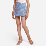 Front View of a Model wearing Blue Block Printed Button-Down Skirt