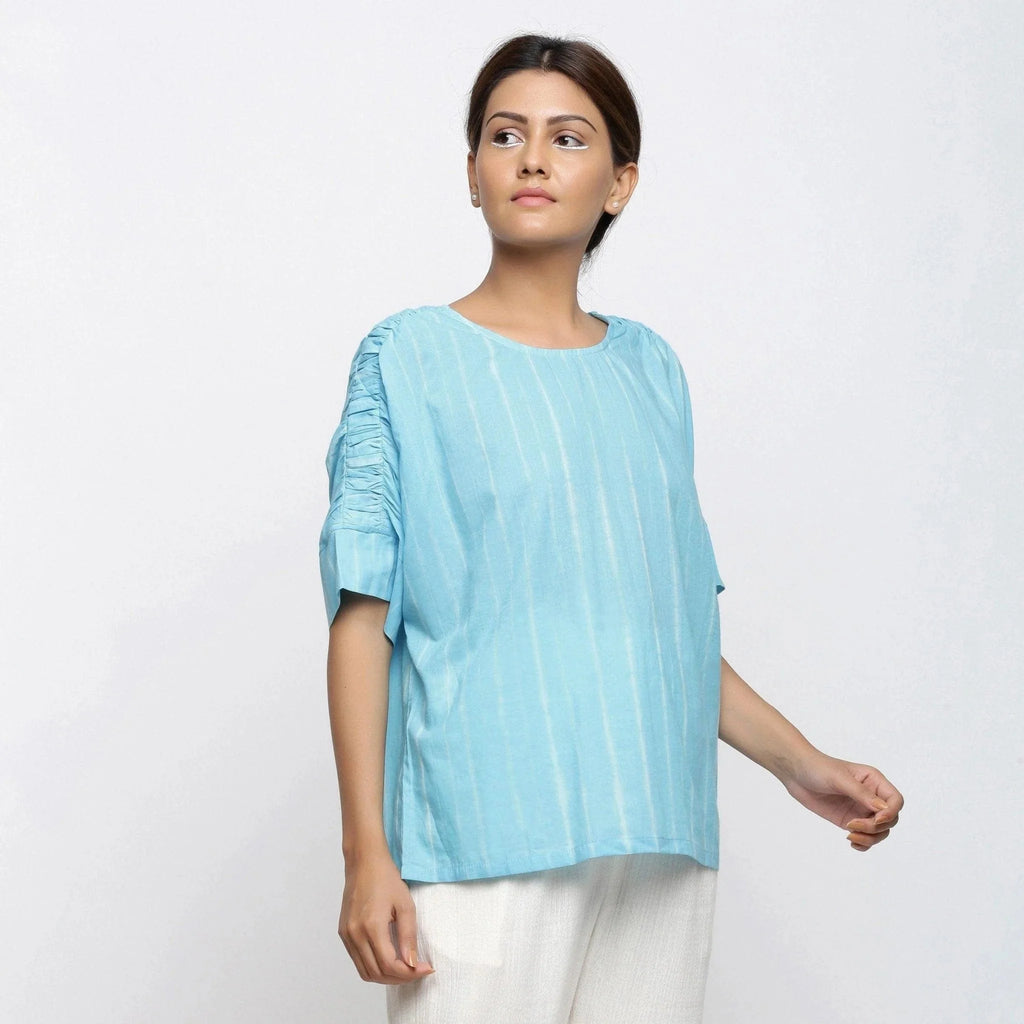Right View of a Model wearing Blue Cotton Tie Dyed Straight Top