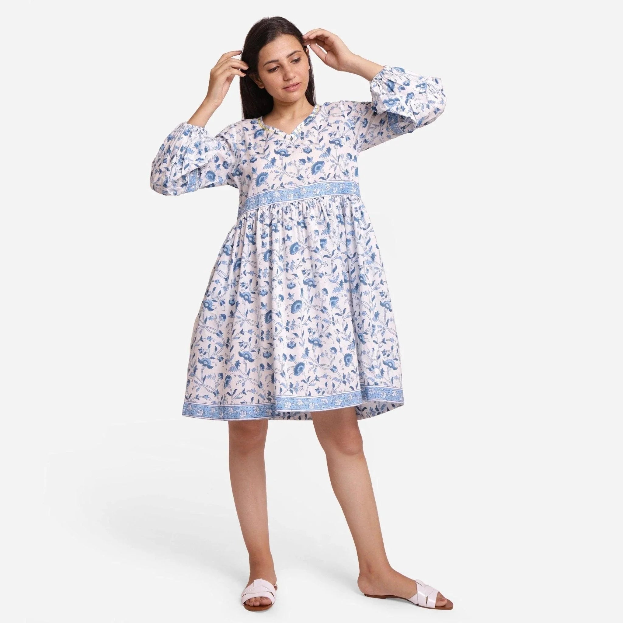 Front View of a Model wearing Blue Floral Fit and Flare Cotton Dress