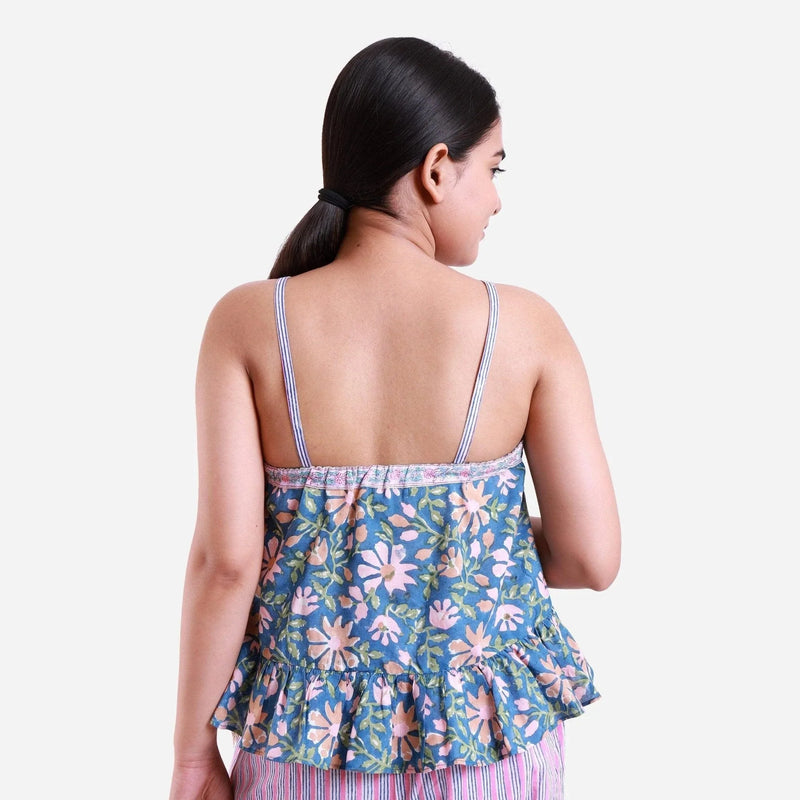 Back View of a Model wearing Blue Floral Block Print Frilled Cotton Camisole Top