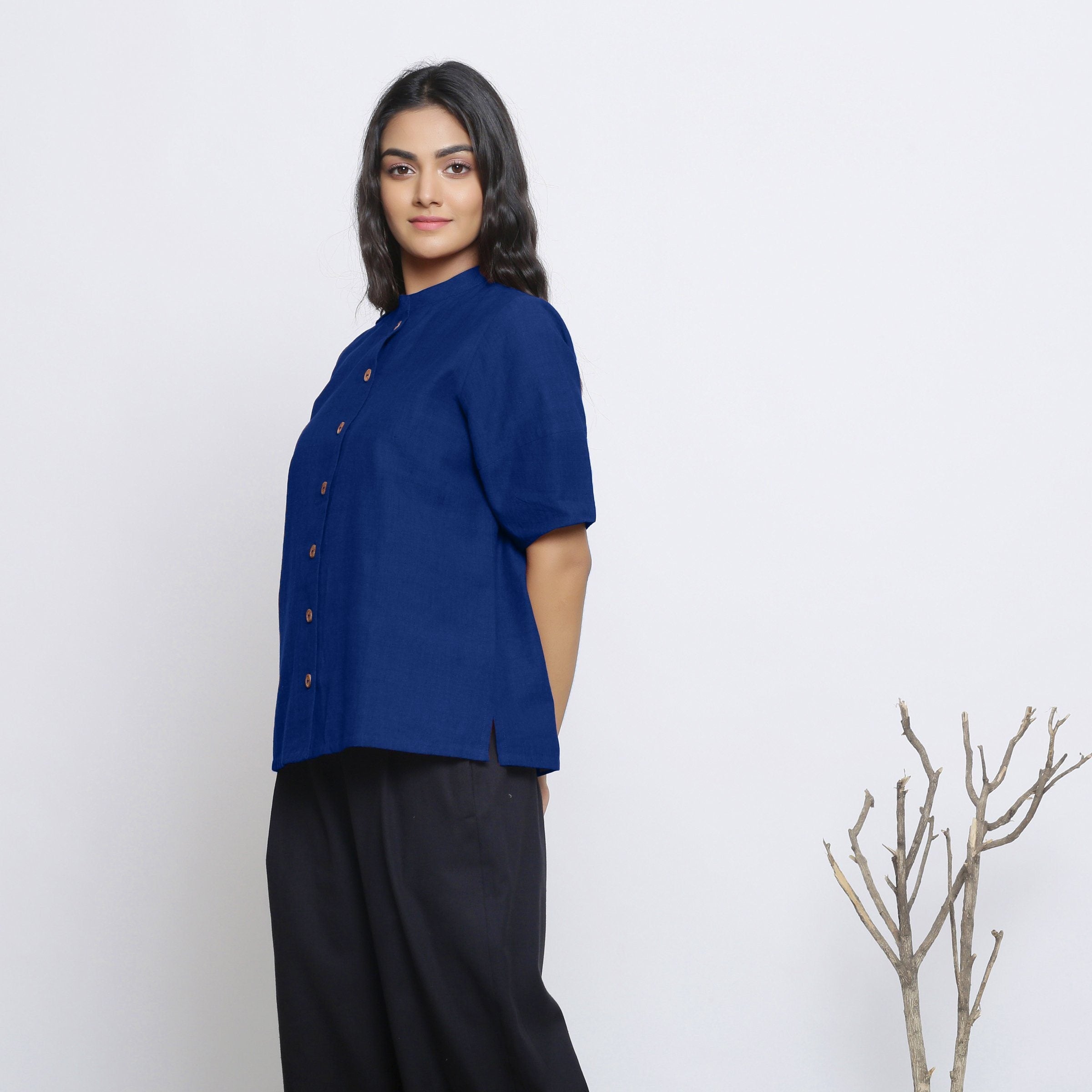 Left View of a Model wearing Blue Handspun Cotton Button-Down Top