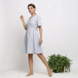 Left View of a Model wearing Blue Handspun Paneled A-Line Dress