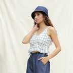 Left View of a Model wearing Blue and Off-White Checks Vegetable Dyed Handspun Cotton Peplum Wrap Top