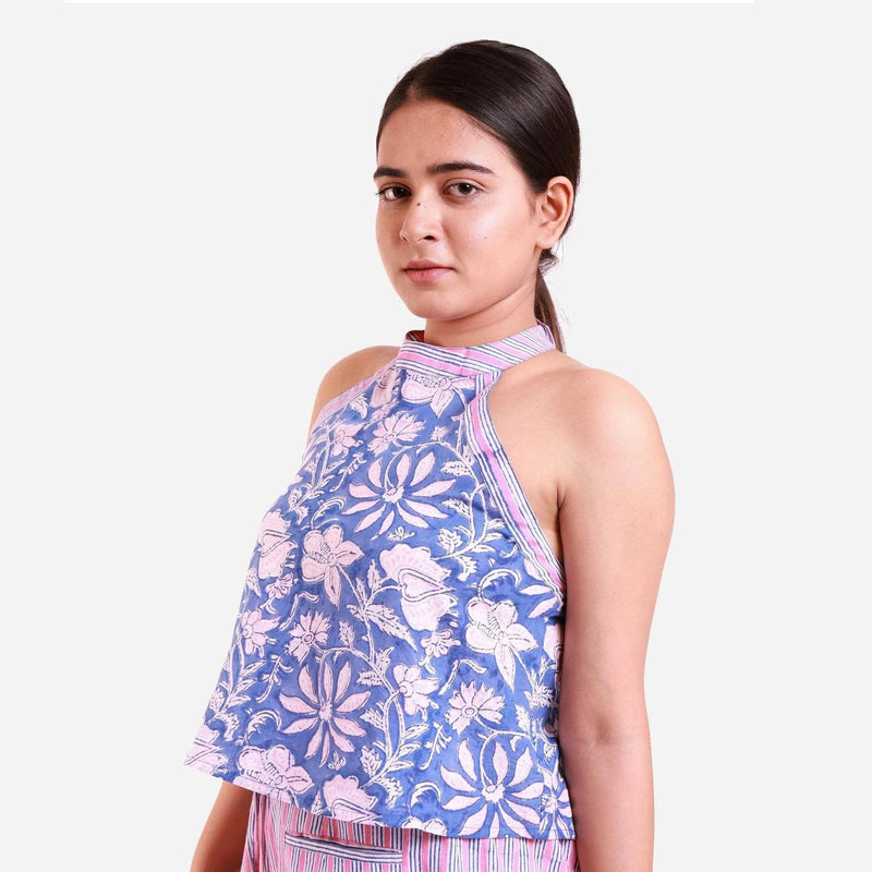 Left View of a Model wearing Blue Floral Halter Neck Short Top