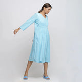 Right View of a Model wearing Blue Tie-Dye Cotton Midi Fit and Flare Dress