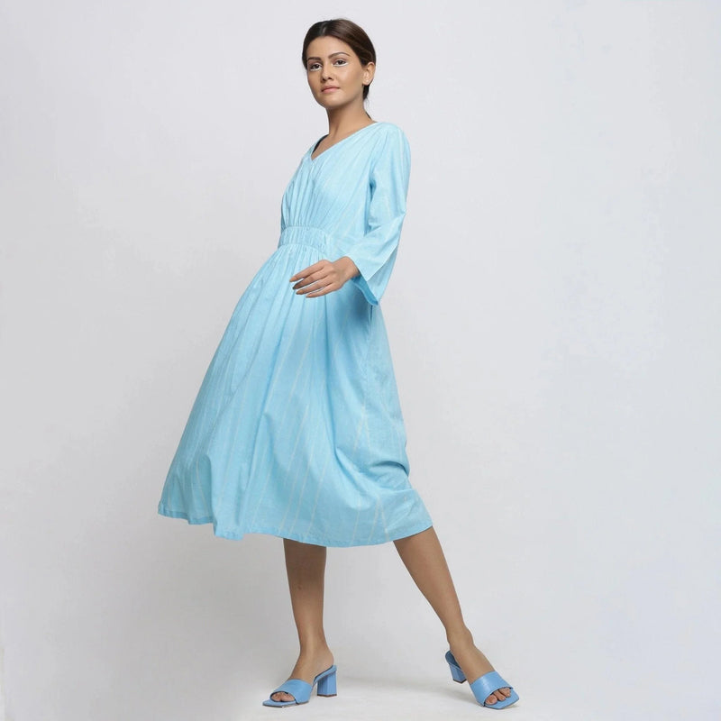 Left View of a Model wearing Blue Tie-Dye Cotton Midi Fit and Flare Dress