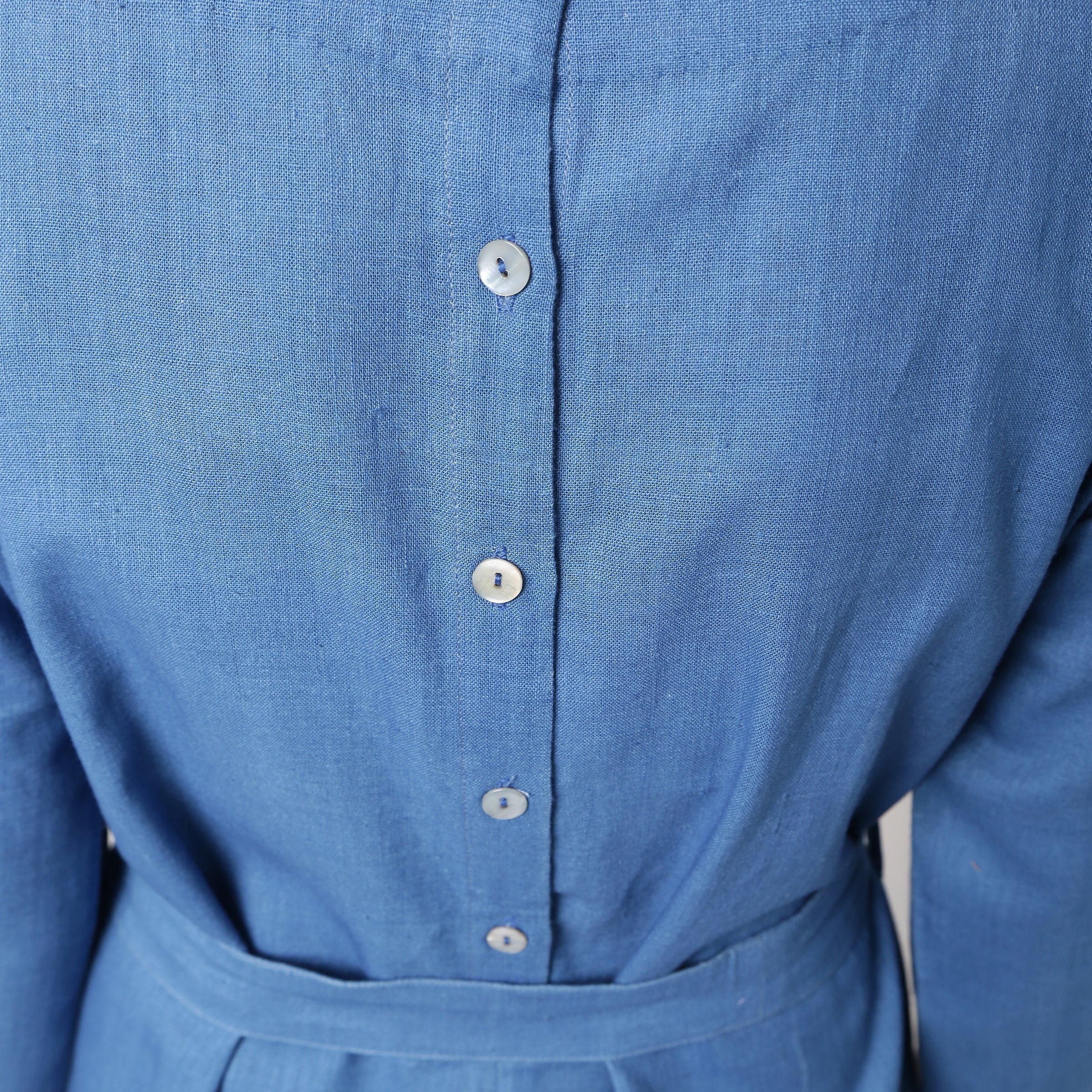 Front Detail of a Model wearing Blue Vegetable Dyed Straight Jumpsuit