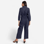 Back View of a Model wearing Blue Wide Legged Cotton Overall