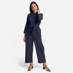 Front View of a Model wearing Blue Wide Legged Cotton Overall