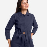 Front Detail of a Model wearing Blue Wide Legged Cotton Overall