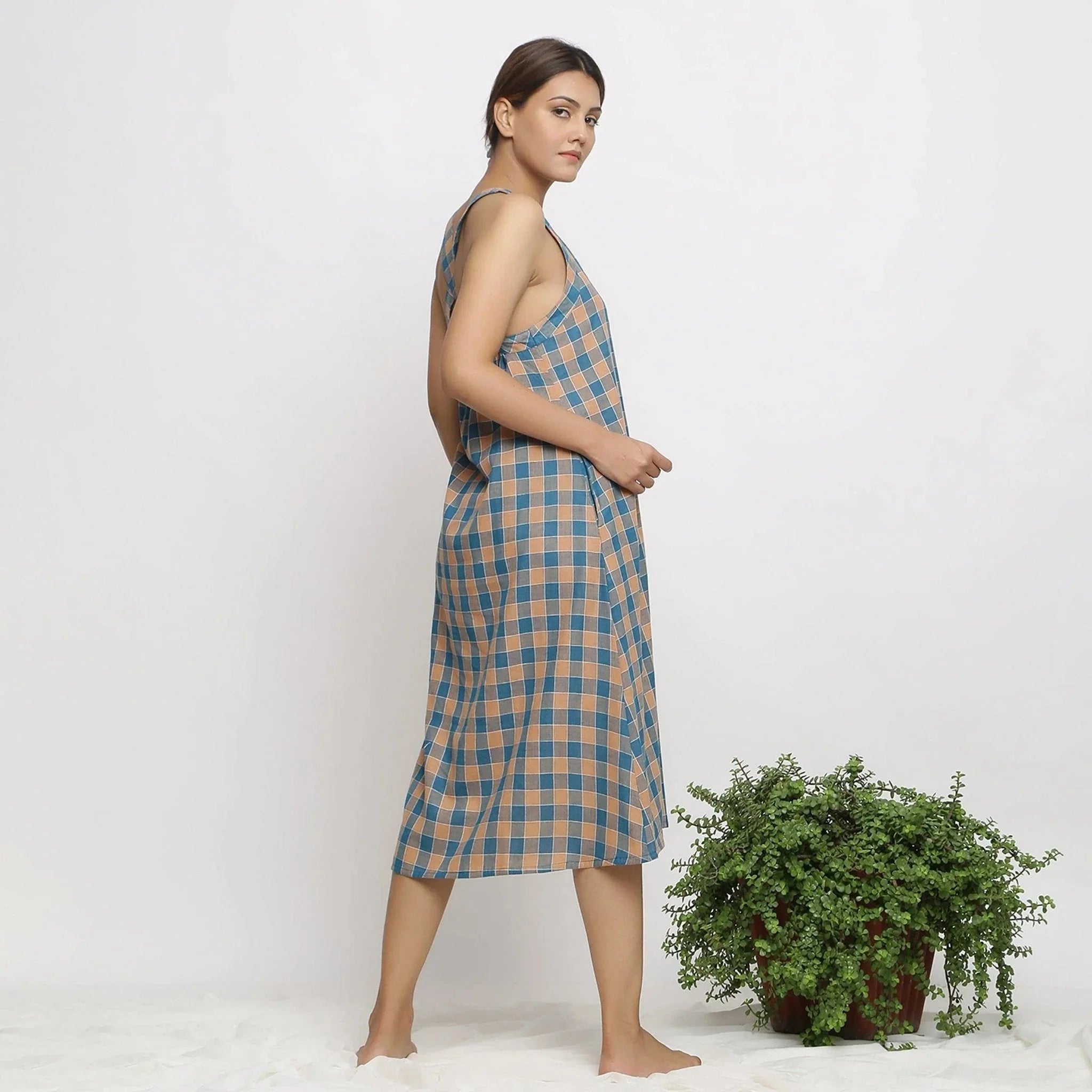 Back View of a Model wearing Bottle Green A-Line Shift Handspun Dress