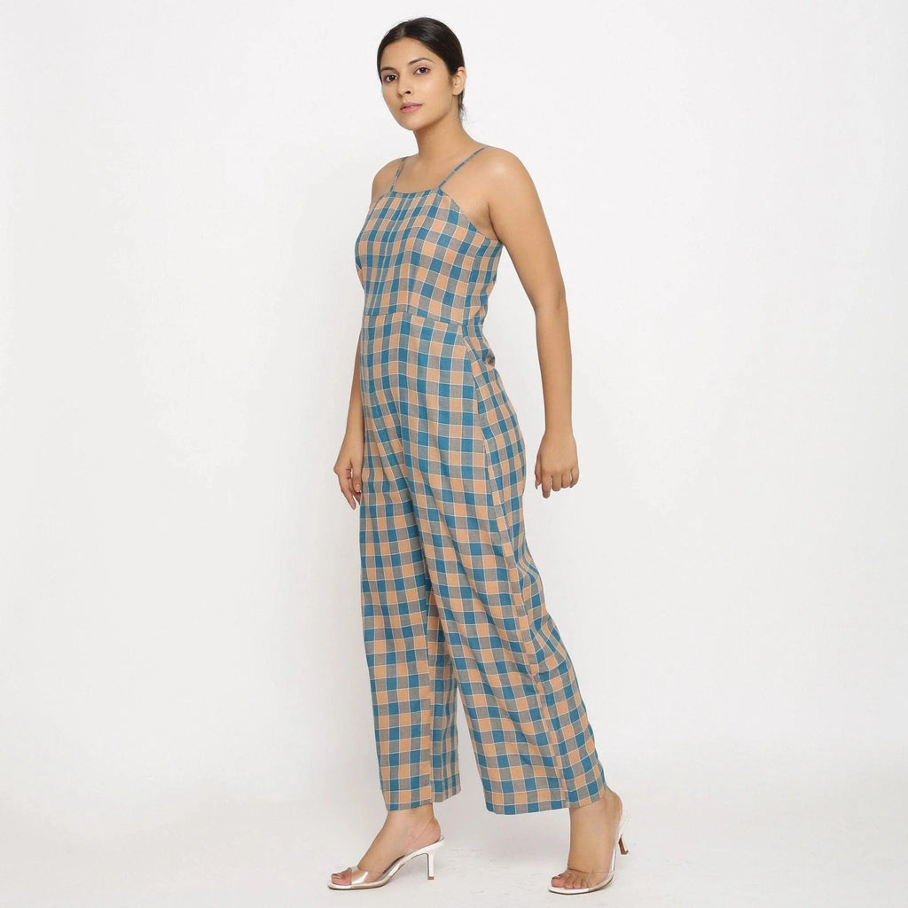 Left View of a Model wearing Bottle Green Handspun Strappy Jumpsuit